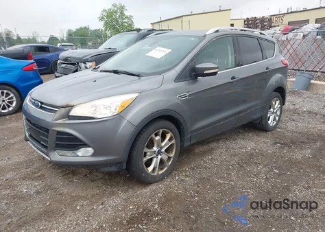 2014 Ford Escape Titanium z USA, uszkodzony, nr VIN 1FMCU9J94EUD53193